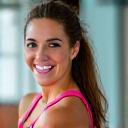 Emily Roberts in activewear, smiling post-workout.